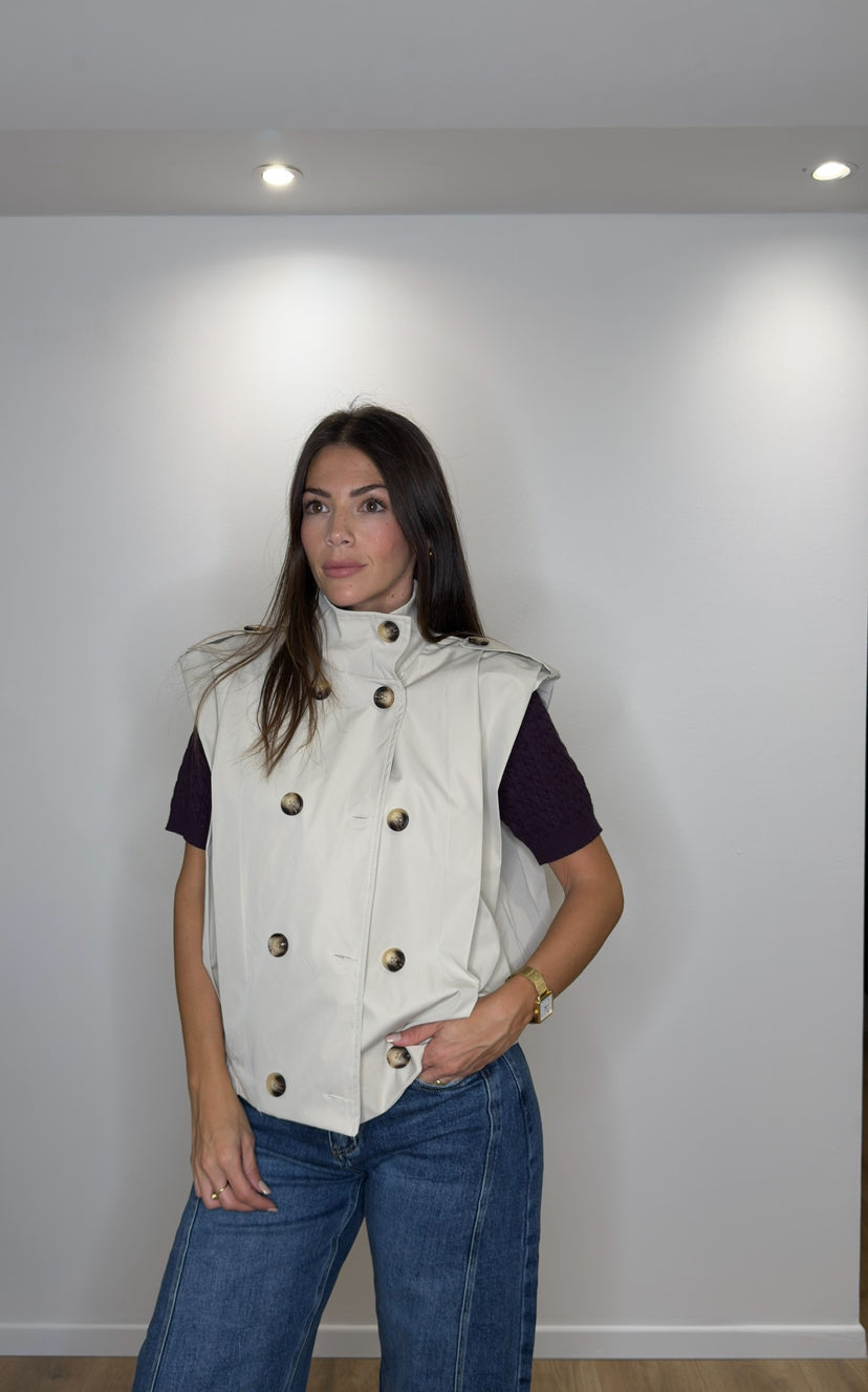 Trench smanicato